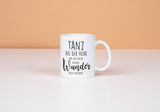 Tasse mit Spruch Positive Perspektiven: "Tanz aus der Reihe und lass dir die kleinen Wunder nicht entgehen" Kaffee Büro