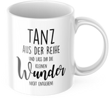 Tasse mit Spruch Positive Perspektiven: "Tanz aus der Reihe und lass dir die kleinen Wunder nicht entgehen" Kaffee Büro